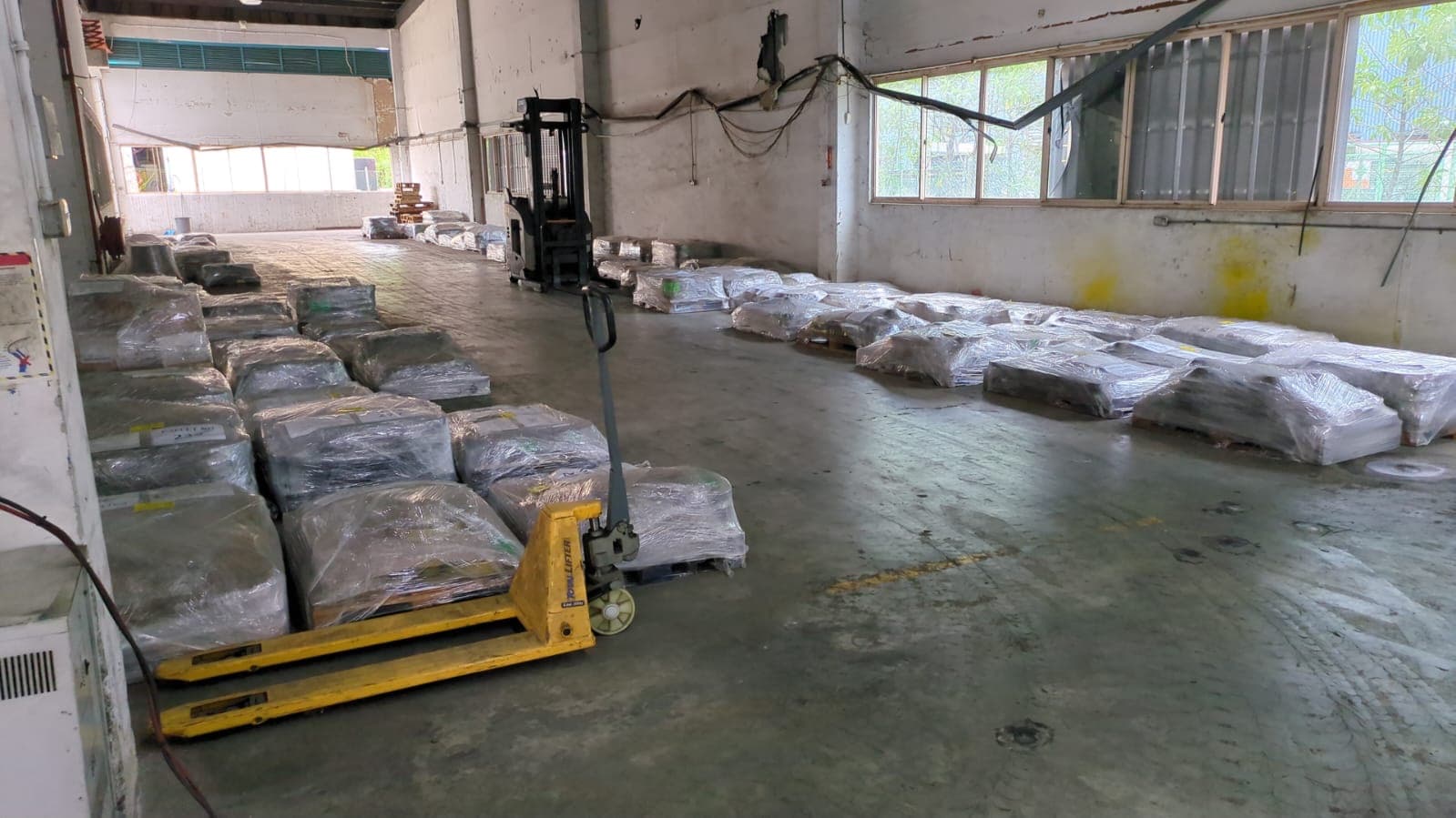 Warehouse floor with materials staged for dispatch